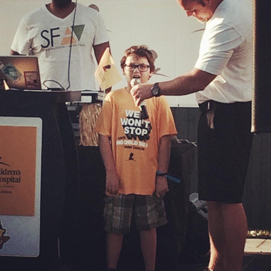 (Above) Danny Thomas, the founder of St. Jude, proclaims, “No child should die in the dawn of life.” Zane Rimes was invited to give a speech during the 2019 walk. The St. Jude Team members of the walk gave Zane a moment to shine by allowing him to say a couple of words pertaining to why people should donate to the cause. He also said things about how exciting the walk would be! All photos courtesy of Mrs. Maranda Arnold. 
