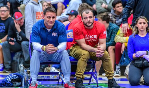 (Above) Coach Mike Palazzo (left) and Coach Donny Simpson (right) matside during a
huge finals match at the Doc Buchanan tournament in California. The Doc Buchanan is
one of the biggest and most important tournaments in the country. Photo courtesy of
Trackwrestling.com.