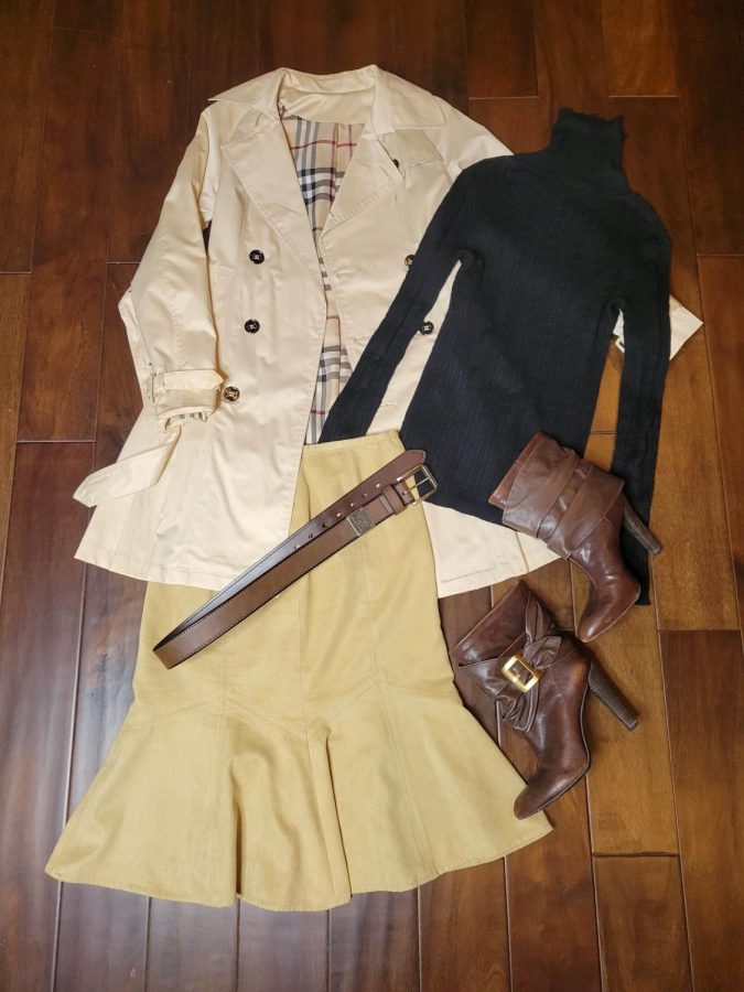 Dark Academia is best described as vintage uniforms seen on students from elite
boarding schools (think of Hogwarts). The main colors are black, dark brown, and beige. Add anything with an
elite university feel
to it: coats, checked
trousers, vintage
tweed pants, scarves,
and long socks.
Elegant shoes and a
leather satchel are

the perfect accesso-
ries. This look is lightly accesorized, perhaps a simple wristwatch or wire framed glasses. Imagine writing brooding poems whilst taking long sips of coffee. This look is lightly accesorized, perhaps a simple
wristwatch or wire framed glasses. Imagine writing
brooding poems whilst taking long sips of coffee. Photo by Serena Young