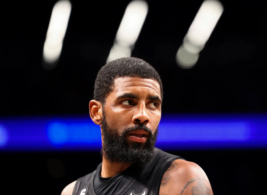 (Above) The New York Nets suspended their star player, Kyrie Irving, for at least five games after promoting an anti-Semitic documentary. He initially
 received no punishment from the NBA, but after fans and former players, including Charles Barkley, slammed the Nets and the NBA for their response, the Nets ordered a suspension without pay. This incident goes to show that fans have power. When organizations and companies stay silent on hate, we can vote with our dollars and force change. Irving, like Ye, also lost many sponsorship deals for his comments. Photo courtesy of The New York Times.

