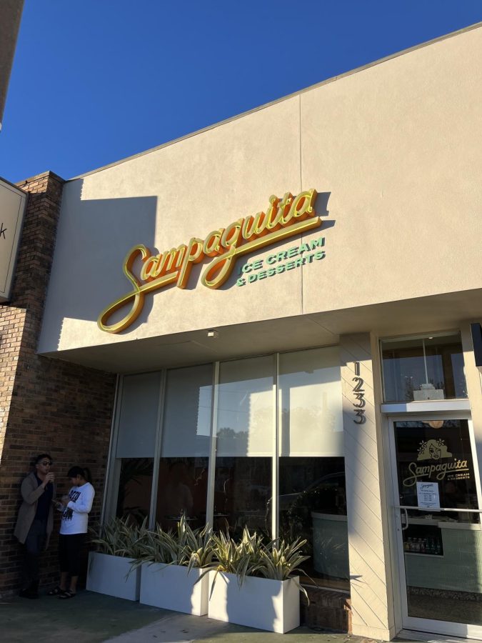 (Above) Following a year of development, the Filipino ice
cream parlor, Sampaguita, finally opened its doors on

Colonial Drive at the beginning of the new year. Sam-
paguita, translating to Arabian Jasmine, is the national

flower of the Philippines, and is used in herbal teas
and remedies. The restaurant is the sister store of The
Greenery Creamery, and with 12 Filipino-inspired flavors,
Sampaguita almost serves as a sweet gateway to Filipino
cuisine. I visited during its soft opening. Even though I
arrived fifteen minutes early, the line already stretched
past two of its neighboring stores and, by the time
Sampaguita opened, past the block. Selflishly, I hope
the demand stays (I could do without the line though).
Sampaguita, in all of its trendiness and retro interior,
provides much needed representation in an area teeming

with other Asian restaurants.
