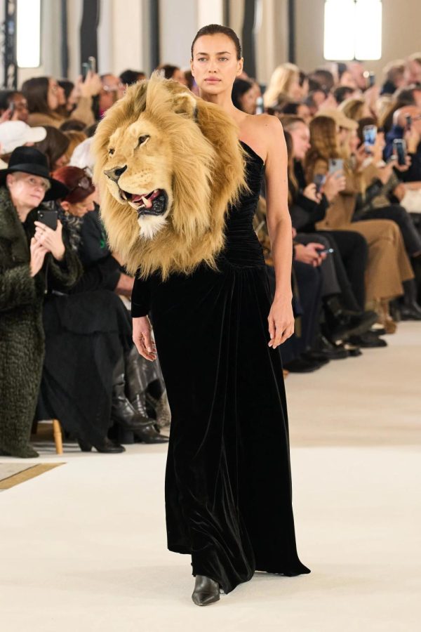 (Above) The 2023 Paris Fashion Week began with a viral
collection from the fashion house, Schiaparelli, inspired
by the animals from the epic poem, “Dante’s Inferno.”
Though the designer used only faux fur, the feedback
has been polarizing, to say the least. Some critics,
such as model, Christie Brinkley, called the collection a,
“Huge faux-paw,” a play on the word, faux-pas, claiming
to glorify poaching. Others, including myself, believe
Schiaparelli’s work is a testament to how useless the
fur industry is. By creating hyper-realistic busts of
animals, the designer further justifies faux fur’s place
in the fashion industry. Photo courtesy of Filippo Flor.