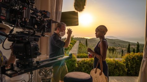 (Left) The director, Rian

Johnson (left), is instruct-
ing one of the actors in the

film, Janelle Monáe (right).
The production of Glass
Onion took place from June
to September 2021 with a
40 million dollar budget.
Glass Onion was filmed in
two different locations,

Spetses, Greece, and Bel-
grade, Serbia. This film

was on a 40 million dollar
budget. Photo courtesy of
Netflix.