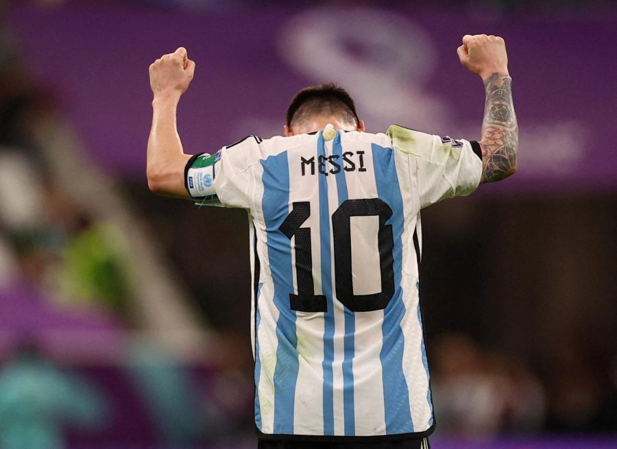 (Left) Messi points to the
sky after scoring a goal to
honor his grandmother. After
winning, Messi said, “I knew
God would bring this gift to
me. I had the feeling that
this [World Cup] was the one.”
Photo courtesy of Kai
Pfaffenbach.
