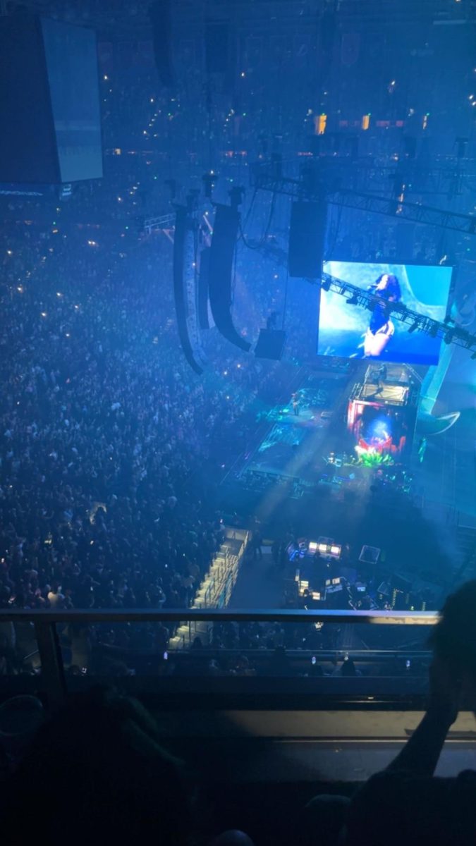 (Above) Singer and rapper SZA performs at her concert on September 22, 2023. Fans can be seen filling the Amalie Arena in Tampa, Florida to watch her. This performance was part of her S.O.S. Tour, about which Rolling Stone commented, “SZA lives up to all the anticipation” on opening night. 