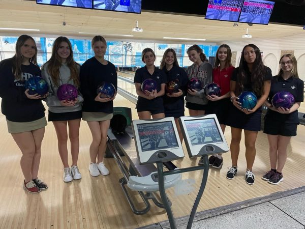 (Above) The girls Varsity Bowling team likes to take lots of photos so they can look back and remember the fun times they had with their friends. It is important to have a great team chemistry to help the team improve and make friends during the season.