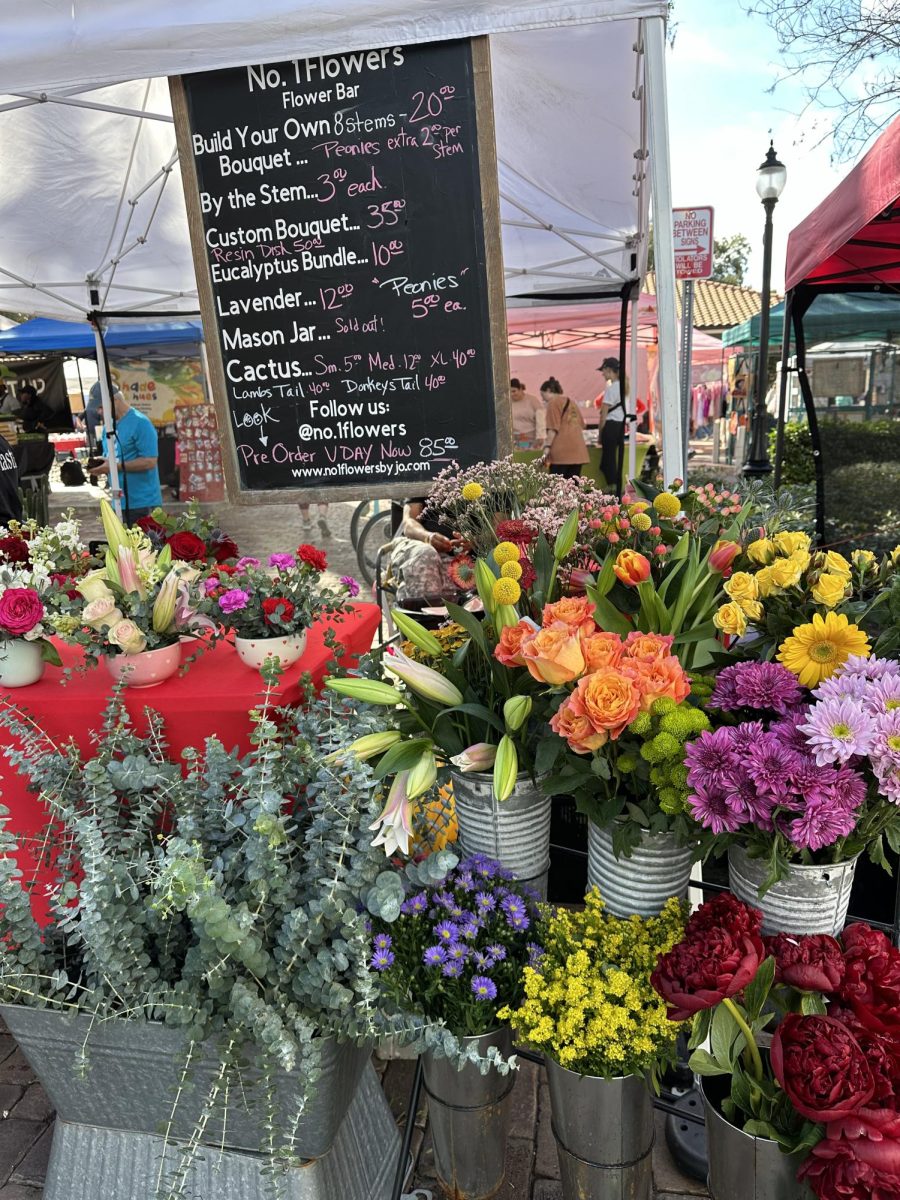 (Above) No.1 Flowers is one of the many flower booths at the Winter Garden Farmers’ Market. What makes these flowers stand out from the rest of the options is the vivid, wide selection of flowers that No.1 Flowers has to offer. No.1 Flowers also offers wedding, funeral, and party arrangements for flower decor. They also offer a floral mastery class open to florists, wedding planners, event designers, and more to learn the proper floral skills or boost their floral knowledge to the next level. www.no1flowersbyjo.com is the website for No.1 Flowers, and their services range from planning and arranging floral wedding decor to wide selection of flowers.