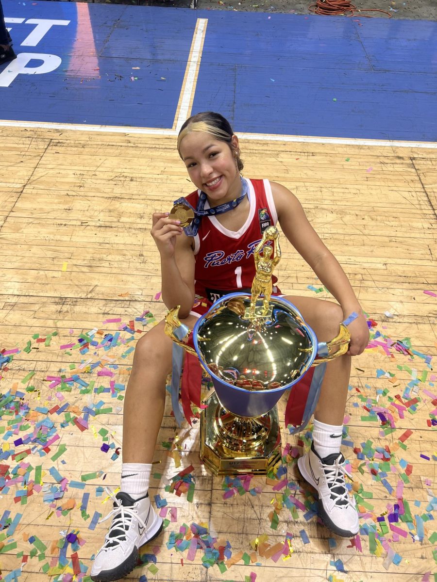 (Above) Camila De Pool Maisonet, grade 12, celebrates winning the last tournament of the season with team Puerto Rico. Camila hopes to continue her career with this team.