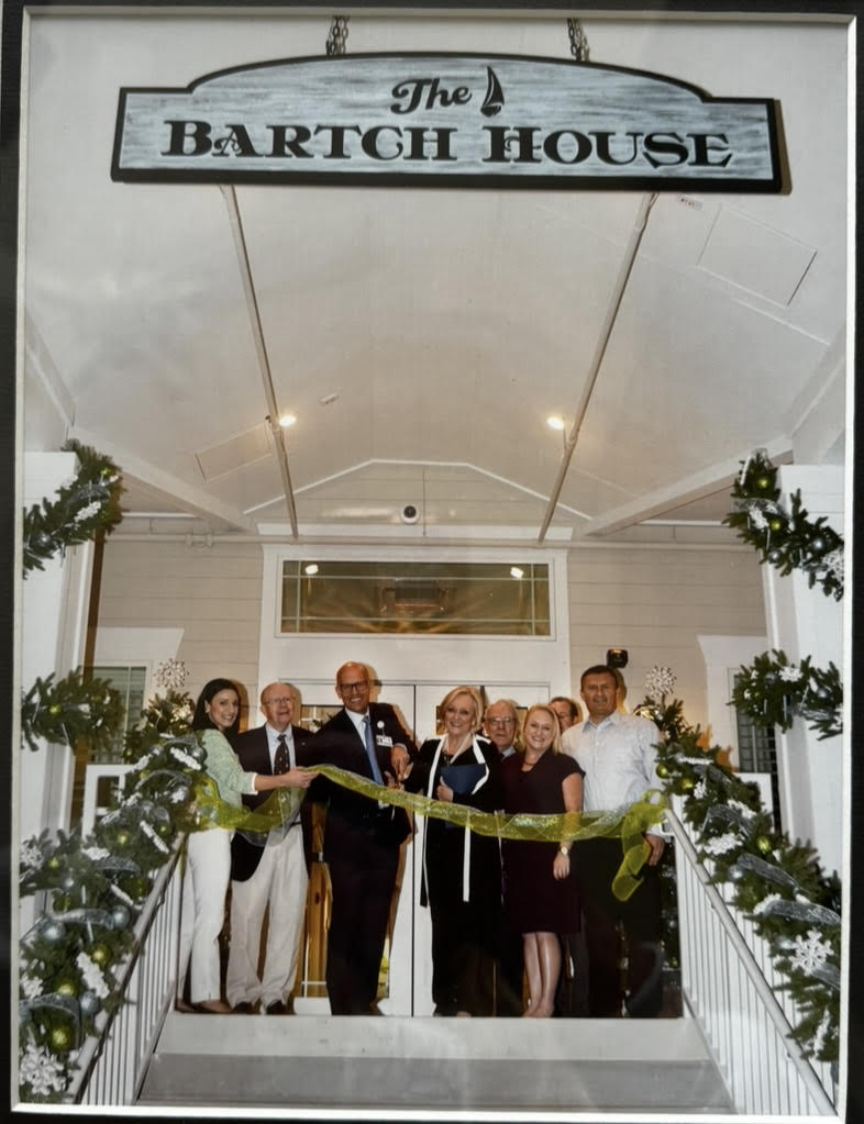 (Above) Cheryl Bartch (right, center) Kristen Knight (right, middle), and Greg Knight (back, right) gather on the front steps of The Bartch House, ready to witness its official opening. The ribbon-cutting ceremony for The Bartch House marked the beginning of what is now considered a foundational part of The Advent Health Transplant Institute, helping families navigate through their individual transplant journeys.