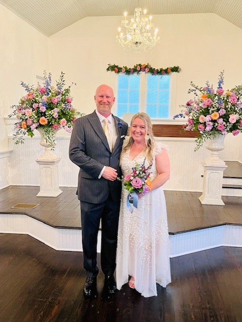 (Above) “When you know, you
know,” says Mrs. Christensen about her
husband, Tim Christensen. On August 2, 2024, the two tied the knot in a small
intimate wedding at The Chapel at Hannibal Square in Winter Park. Mrs. Christensen’s sister, Audrey, officiated the marriage.