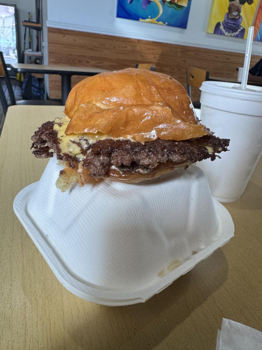 (Above) The burgers served at Cow and
Cheese show off their distinct flavors. The restaurant has a vibrant atmosphere with outstanding music.