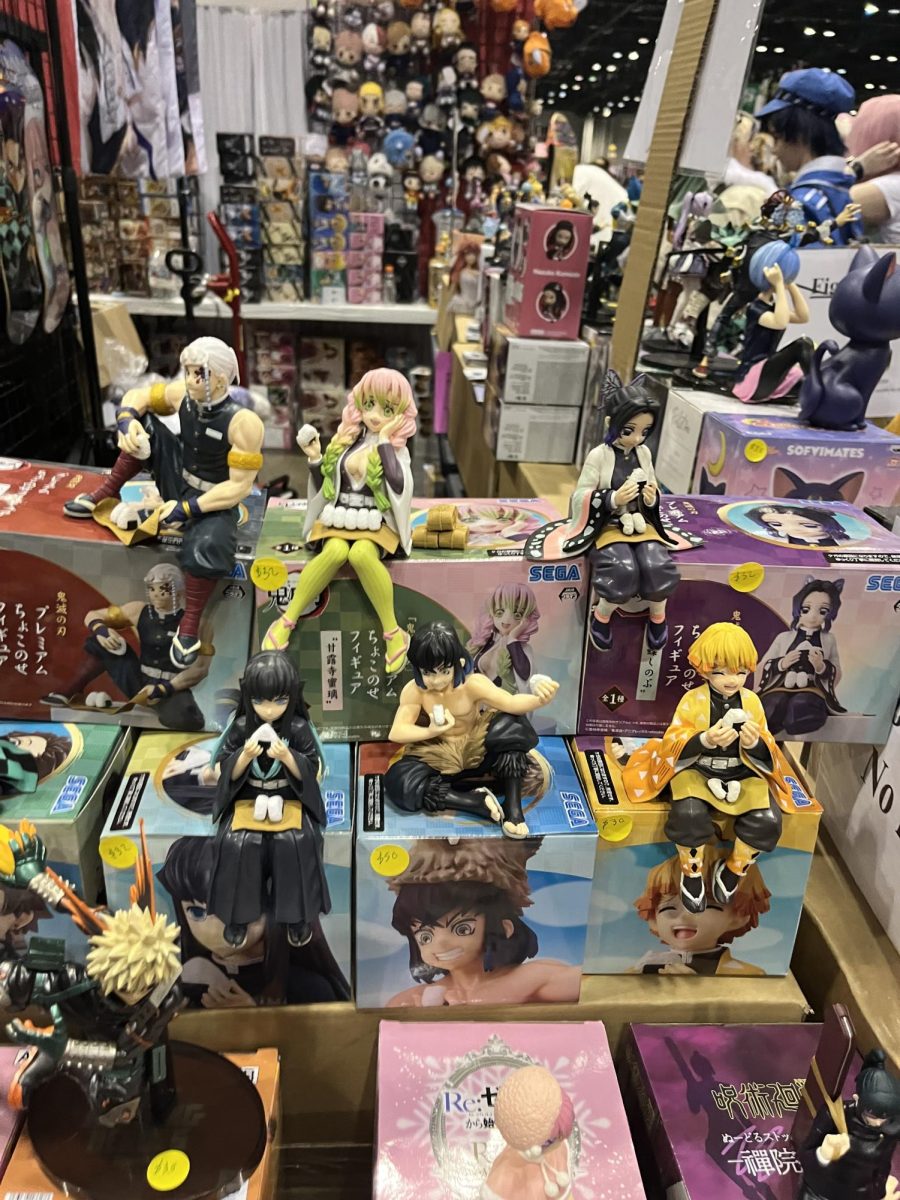 (Above) At the Artist's Alley one of the more common things to be sold are figurines. Pictured here are some figures of characters from the anima Demon Slayer. These figurines are collectors items and often sell for a hefty price! 