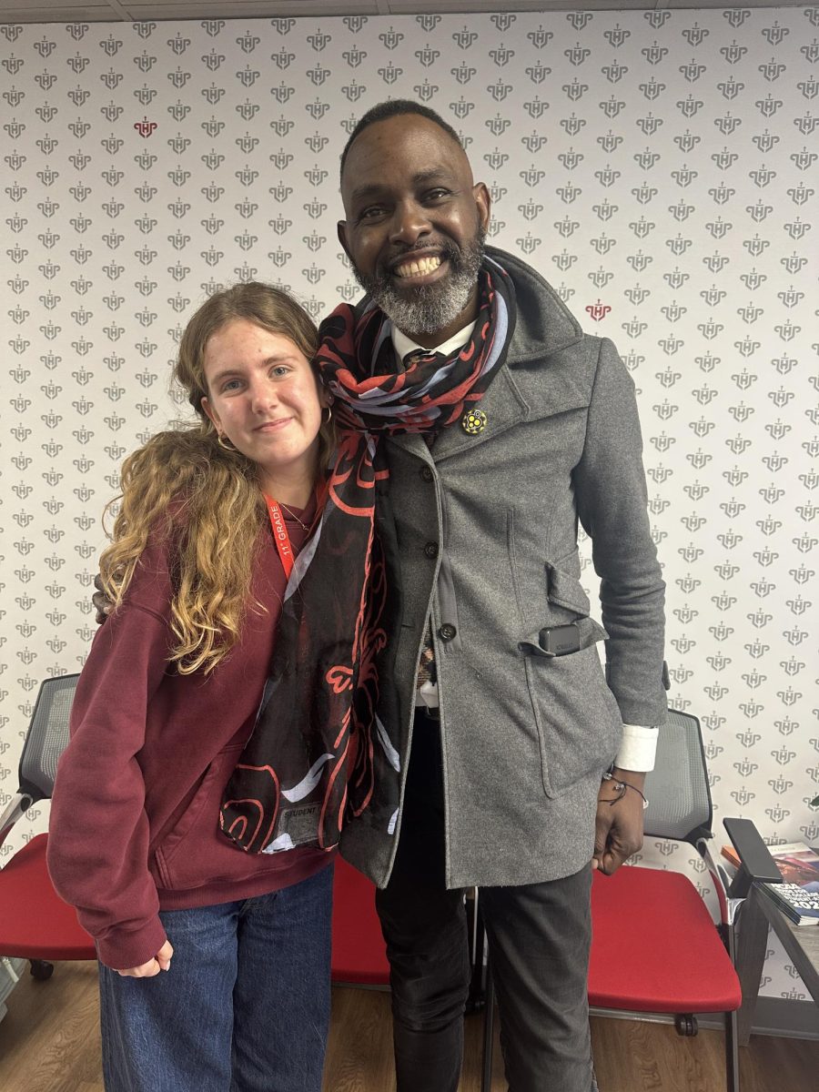 (Above) For Martin Luther King Day this year, Lake Highland Preparatory's Upper School had the honor of hearing Mr. Derreck Kayongo speak during the routine Unity meeting. Students such as myself and others had the opportunity to speak to him one-on-one and ask him questions about his inspiring speech. 