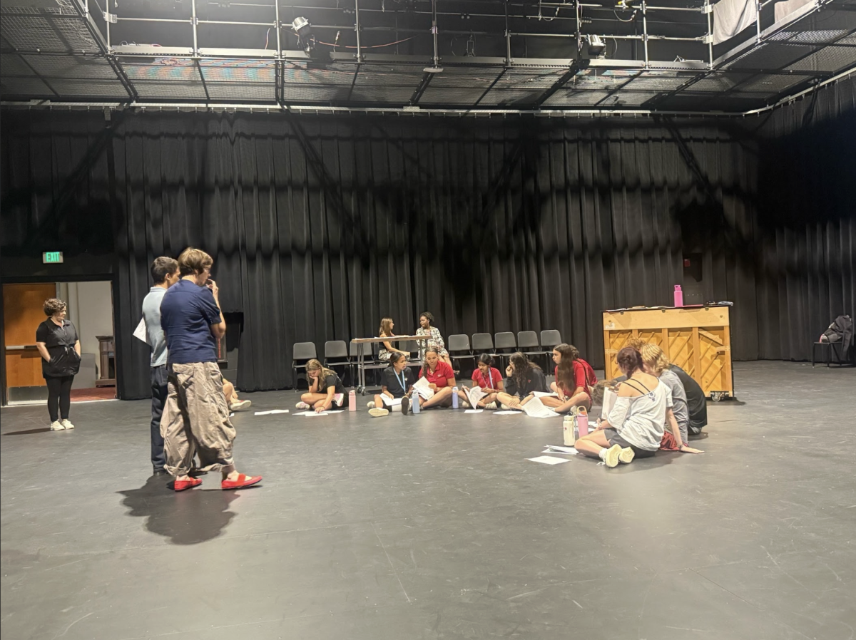 (Above)  The members of Sister Act can be seen memorizing their lines and music as they start rehearsing for their opening night this fall. Lila Klaproth, 11, who plays leading lady Deloris van Cartier says that, "It's nice to see who comes out for thespians every year and how much they have changed." She also states that, "I also love challenging myself with every new piece that we do!" showing the determined mindset that is needed to be a part of Sister Act. 