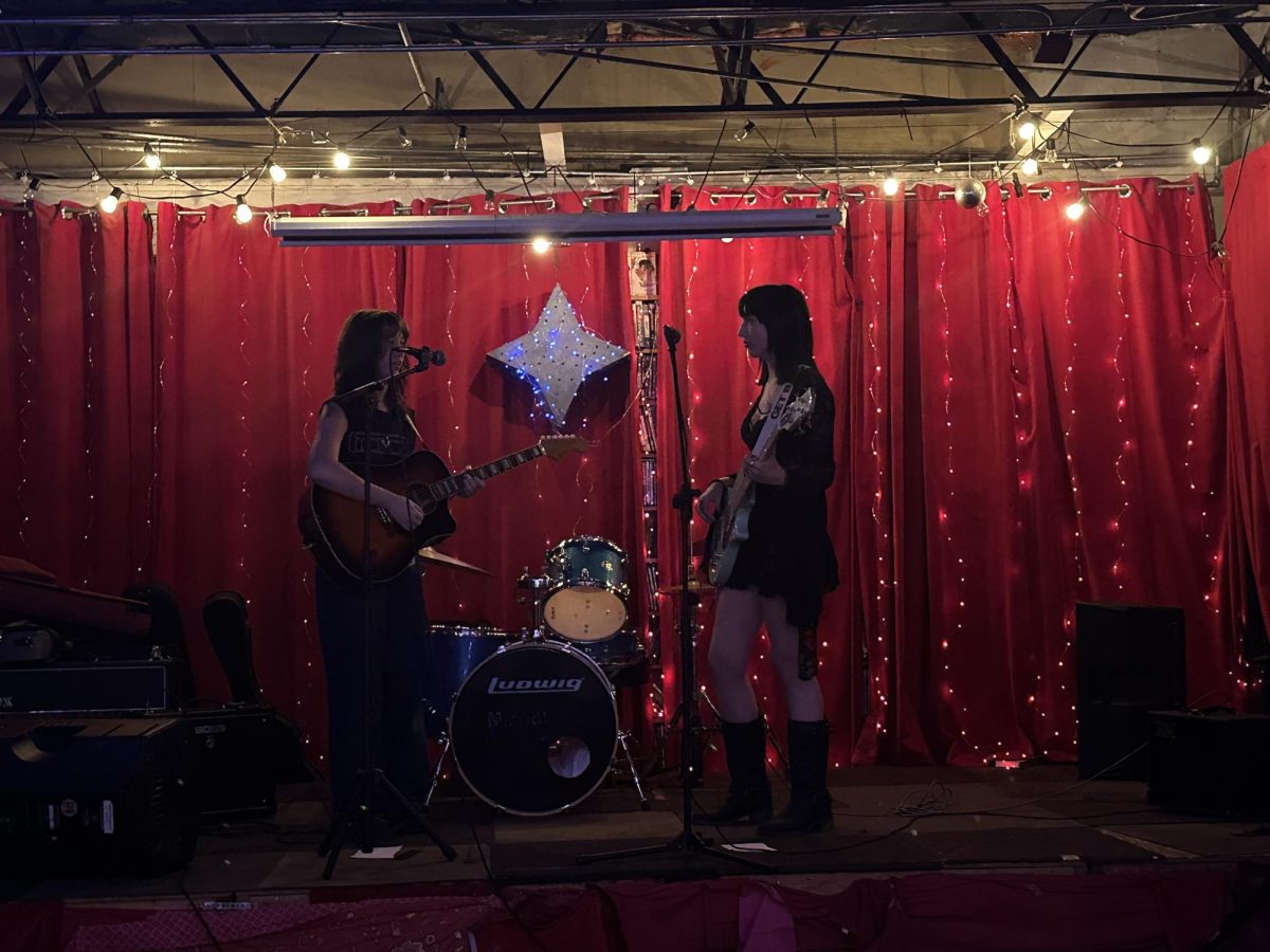 (Above) Before any of the bands performed their sets, fawn, one of the bands, practiced on their guitars to warm up. Smaller venues such as this have a more casual setting as opposed to a larger concert. Stardust offers guests, what typically would be a behind the scenes experience, right in front of them. 