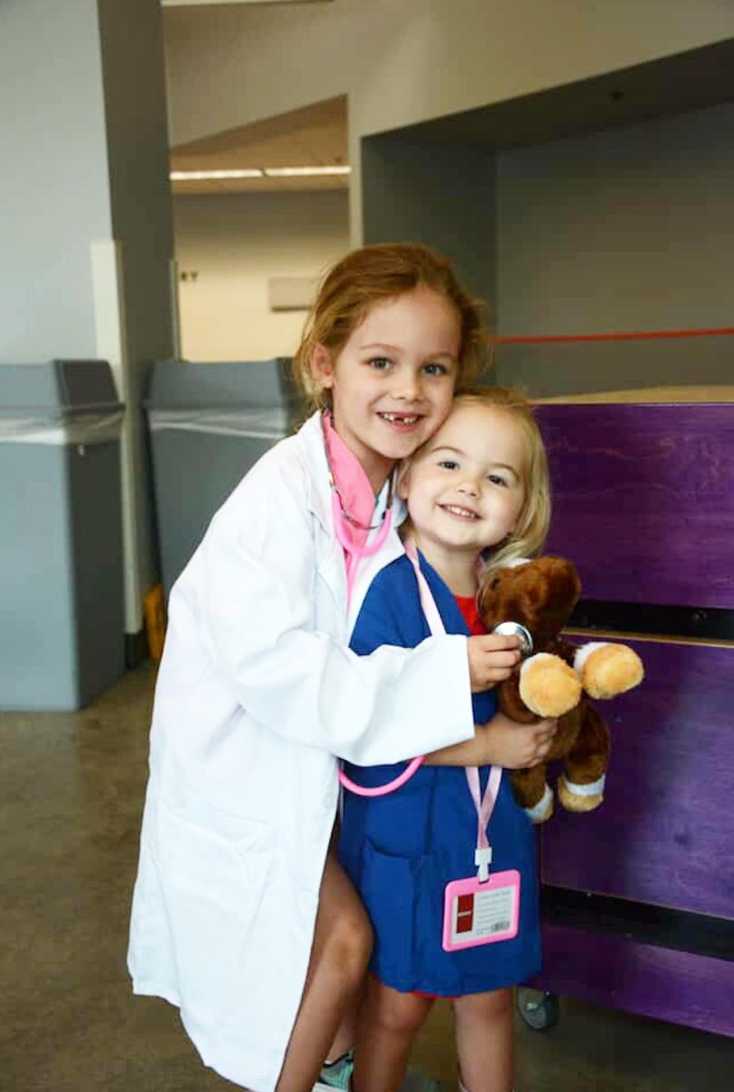 (Above) At the Orlando Science Center Event, there were activities at different stations. One of the stations included a an activity where children could perform
checkups on stuffed animals that many volunteers had donated for the event.