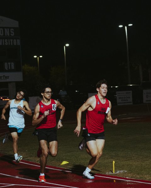(Above) On the left Alexander Betancourt, grade 10, and on the right Christopher Herbet, grade 11, pushed
each other to finish their last event off the meet. The two runners were teammates during cross country season which allowed them to control and communicate the pace for their race.
