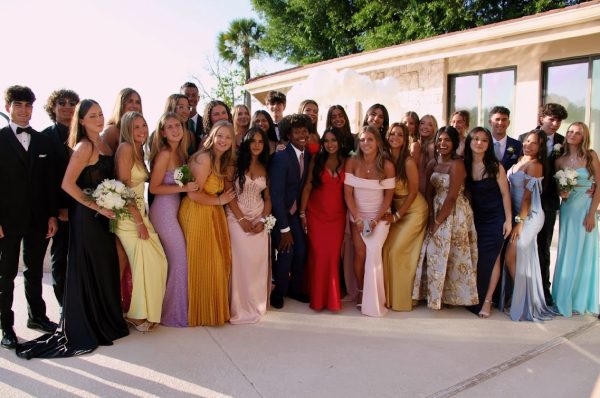 (Above) Last year, friends and family attended the before Prom pictures to socialize with the other parents while taking memorable photos of their kids with their date or friends.